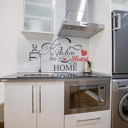 Апартаменти Loft Palya Mar En